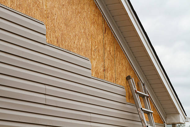 Professional Emergency Siding Repair technician working in Pinehurst, TX